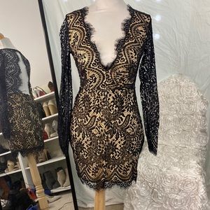 Black lace see through cocktail dress.